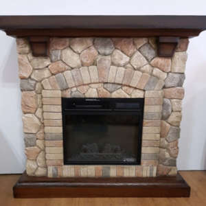 Electric fireplace with decorative stone